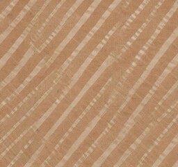 Aufkleber - a diagonal pattern of light brown stripes on a beige background