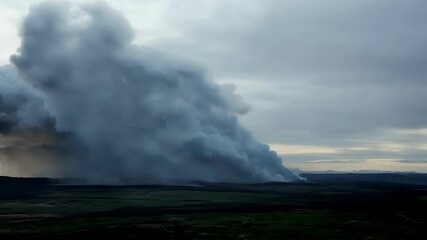Poster - Massive wildfire burns, creating a huge plume of smoke, engulfing everything in its path