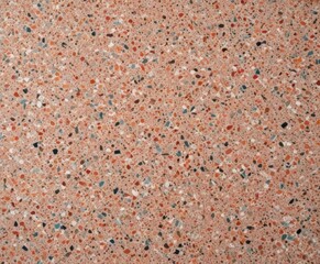 Fototapete - a close-up view textured surface composed of small, irregularly shaped stones in various shades of orange, pink, and white, arranged in a random pattern