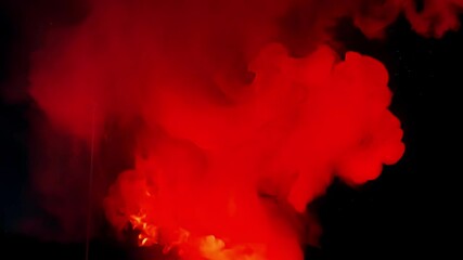 Poster - Vivid red smoke billows from a massive fire at night, illuminating darkness with intense glow, posing risk of destruction and chaos