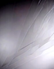 Leinwandbilder - a gradient background transitioning from a light gray to a darker gray, with diagonal lines intersecting at various angles, creating a sense of depth and movement