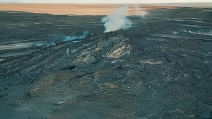 Poster - Smoke billows from a volcano, transforming the landscape into a desolate wasteland, showing the raw power of nature