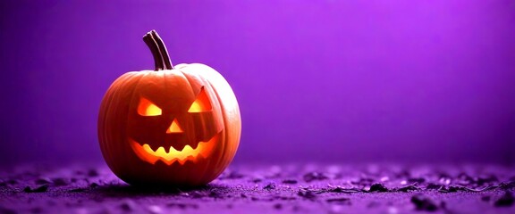 Aufkleber - A carved pumpkin with a smiling jack-o'-lantern face sits on a purple surface, illuminated by a warm glow from within