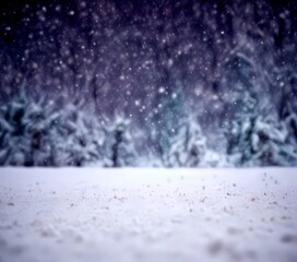 Poster - A snowy winter scene with a blurred background of trees and falling snowflakes