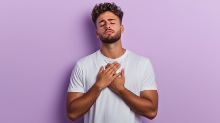 a man holding his chest, eyes closed, a deep expression of relief washing over his face, standing ag