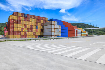 Aufkleber - Stacked containers and empty asphalt road at the port