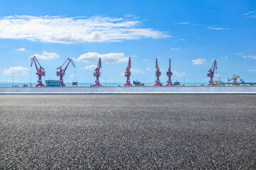 Aufkleber - Asphalt road and industrial cranes in port