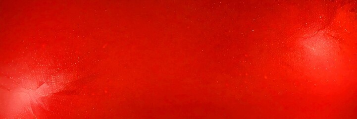 Aufkleber - a red background with a subtle pattern of small white dots, creating a sense of depth and texture