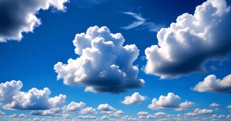 Poster - A vast expanse of fluffy white clouds fills the sky, with a few wispy clouds scattered across the horizon