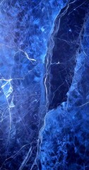 Poster - a close-up view dark blue marble surface with visible cracks and lines, creating a textured and intricate pattern