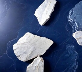 Aufkleber - a collection of white, jagged rocks arranged on a dark blue background, with a subtle pattern of lines and swirls