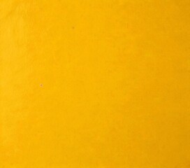 Aufkleber - A simple, unadorned yellow background with a subtle texture