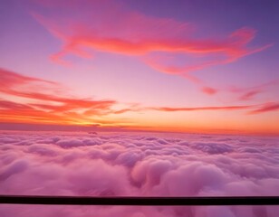 Aufkleber - A breathtaking aerial view sunset over a sea of clouds, with a vibrant gradient of pink, orange, and purple hues