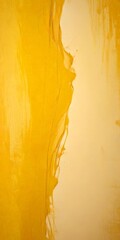 Aufkleber - a vertical strip of yellow paint on a white wall, with a subtle texture and a slight drizzle effect