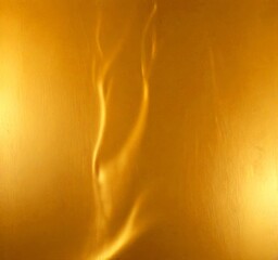 Poster - a close-up view shiny, golden surface with a subtle, swirling pattern