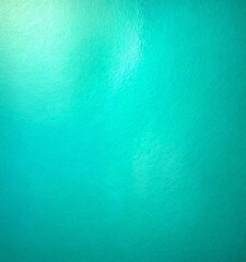 Aufkleber - a close-up view textured, turquoise-colored surface, possibly a water body or a painting