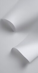 Poster - a close-up view white paper sheet, with a subtle curve and shadow, creating a sense of depth and texture