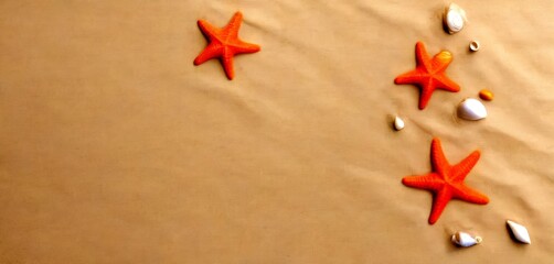 Leinwandbilder - Three orange starfish and various white and beige shells are arranged diagonally on a light beige background