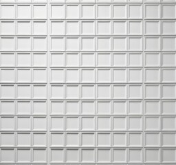 Poster - A grid of white square panels, arranged in a uniform pattern, creates a visually striking and repetitive background