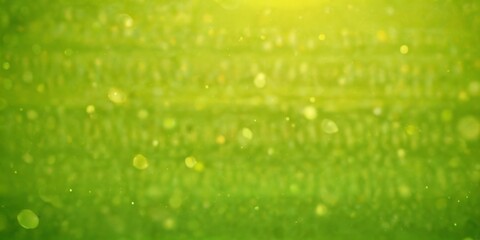 Aufkleber - a blurred, green background with small, indistinct dots or particles scattered throughout, creating a sense of movement and energy