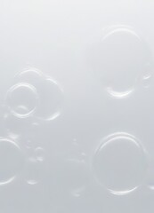 Poster - a close-up view white surface with several transparent bubbles of varying sizes, creating a sense of