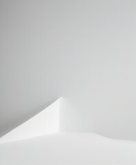 Leinwandbilder - A minimalist white room with a triangular shape on the wall, creating a sense of depth and perspective