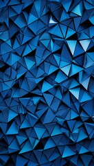 Poster - a geometric pattern composed of numerous blue triangles arranged in a grid-like fashion, creating a visually striking and abstract composition