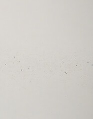 Poster - a close-up view white surface with small black dots scattered across it, creating a speckled pattern
