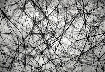Aufkleber - a black and white photograph complex network of intersecting lines and shapes, creating a visually striking abstract pattern