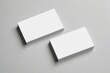 © haiqiang - two blank business cards on a gray surface