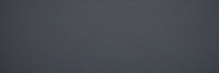 Aufkleber - a dark gray background with no discernible text or objects