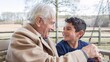 © hobonski - A heartwarming image of a grandfather and grandson sitting together on a porch swing, sharing a smile and a moment of connection. The background features a rural landscape.