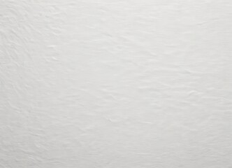 Aufkleber - a close-up view white textured surface, possibly a wall or a piece of paper, with a subtle pattern of small lines or wrinkles