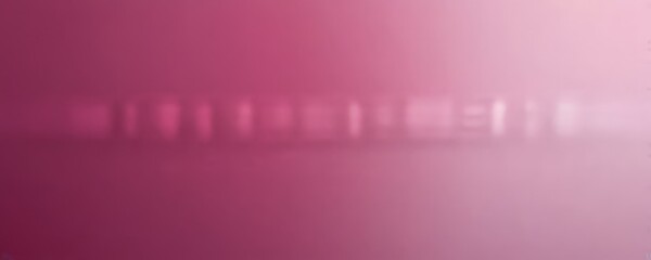 Poster - a blurred pink background with a faint line of white text that reads 