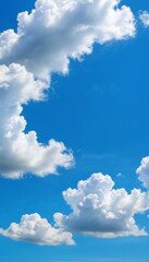 Leinwandbilder - A clear blue sky with fluffy white clouds