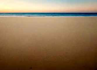 Poster - A serene beach scene with a calm ocean and a light beige sand beach, captured during a tranquil sunset