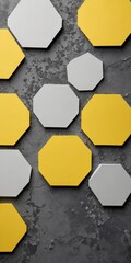 Leinwandbilder - A collection of nine octagonal shapes in various shades of yellow and gray, arranged in a grid-like pattern on a textured gray background