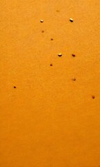 Aufkleber - A collection of small pebbles scattered across a light beige sand surface, creating a sense of depth and texture