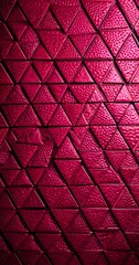 Poster - a close-up view textured surface composed of numerous triangular shapes in a vibrant red color The triangles are arranged in a grid-like pattern, creating a