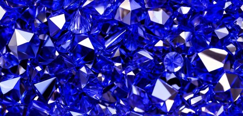 Fototapete - A close-up view collection of faceted, faceted, and faceted diamonds in various shades of blue, set against a dark background