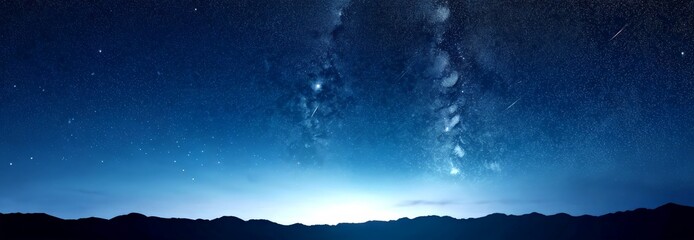 Poster - A breathtaking night sky unfolds over a mountainous landscape, with the Milky Way galaxy's spiral arms stretching across the dark expanse The scene is bathed in a soft,