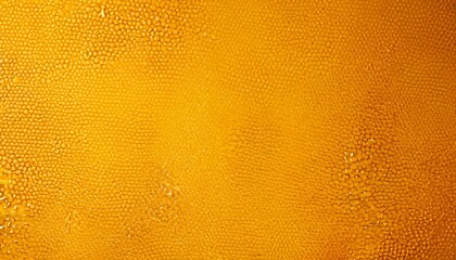 Poster - a close-up view textured surface with a warm, golden-yellow color The surface appears to be made of small, round, and irregularly shaped objects, creating a textured