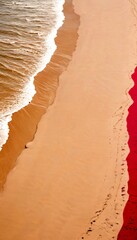 Aufkleber - An aerial view beach with light brown sand, dark red water, and white waves