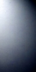 Fototapete - a plain, gray wall with a subtle texture, devoid of any discernible objects or text