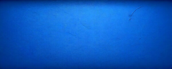 Fototapete - a dark blue wall with a visible crack running horizontally across it