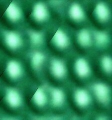 Aufkleber - a blurred green background with a repeating pattern of circles, creating a sense of depth and movement