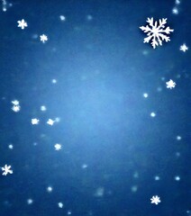 Aufkleber - A starry night sky with snowflakes falling, creating a serene and tranquil atmosphere.
