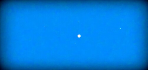 Poster - a clear night sky with a bright moon and a few small stars scattered across it