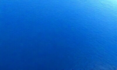 Fototapete - a vast expanse of deep blue ocean, with no visible land or horizon