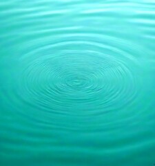 Fototapete - a close-up view calm body of water, with concentric ripples forming a circular pattern The water appears to be a light blue-green color, and taken from